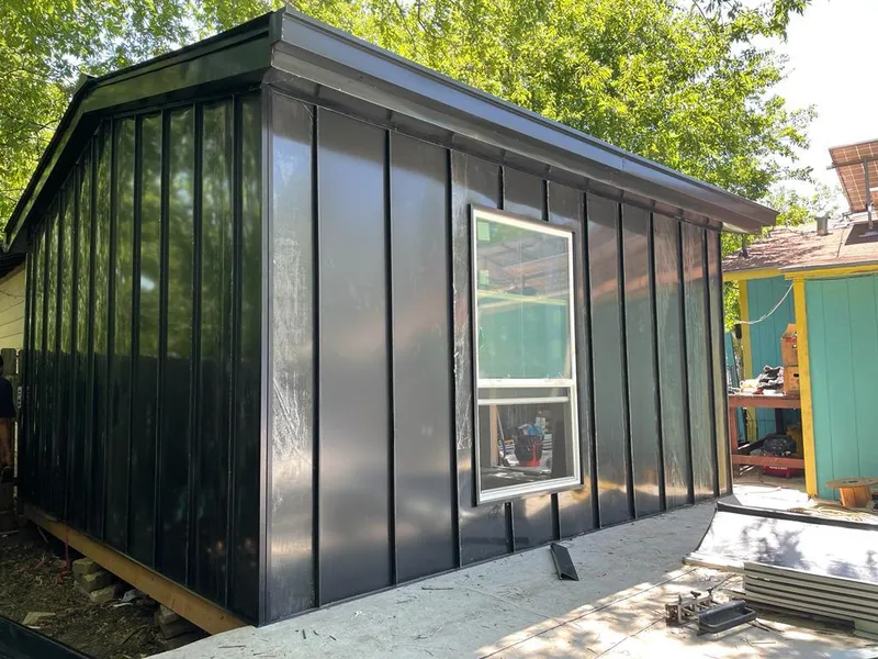 Black standing seam metal wall panels for Metal Roof Installation in Evans